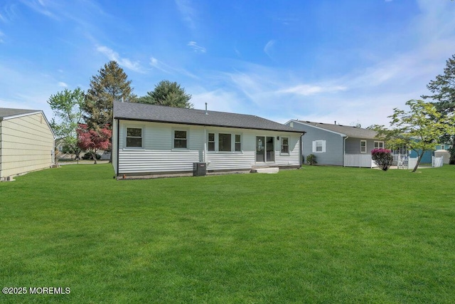 9 Westbrook Dr, Toms River, NJ 08757 - rear view of property with a lawn