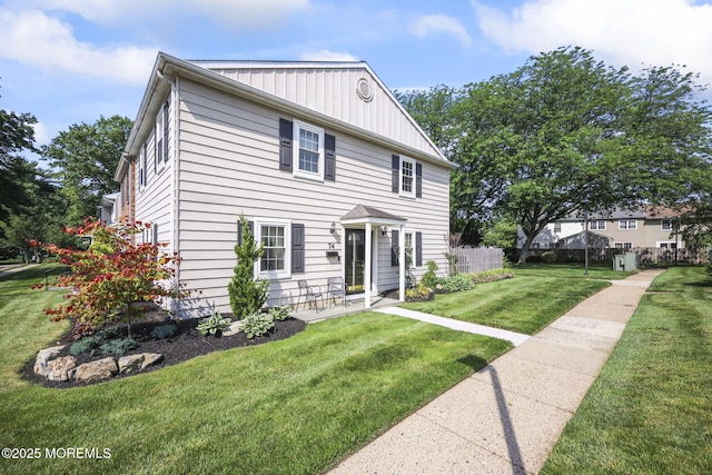 74 Kingsley Way, Freehold, NJ 07728 - view of front of home featuring board and batten siding
