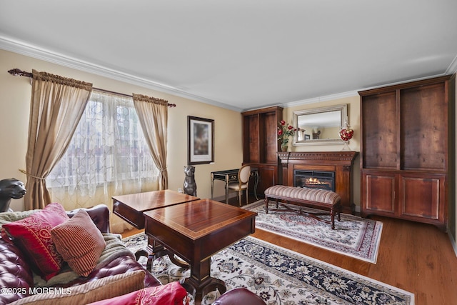 74 Kingsley Way, Freehold, NJ 07728 - living area with crown molding, wood finished floors, and a glass covered fireplace