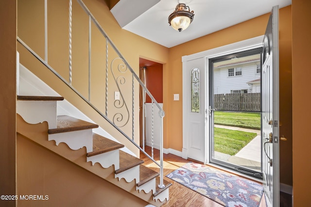 74 Kingsley Way, Freehold, NJ 07728 - foyer entrance with stairway and wood finished floors