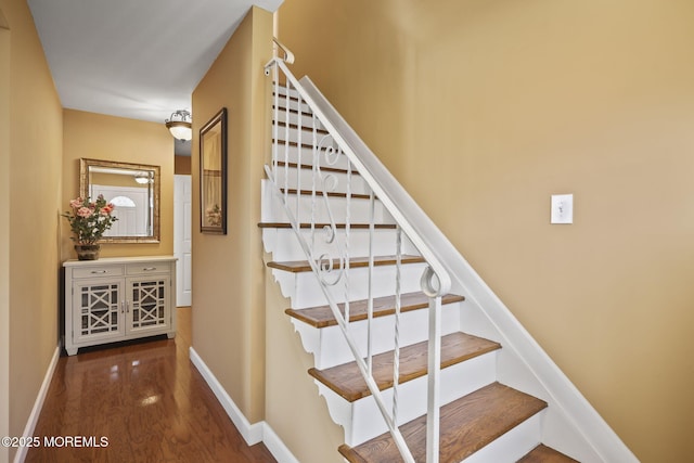74 Kingsley Way, Freehold, NJ 07728 - stairway featuring wood finished floors and baseboards