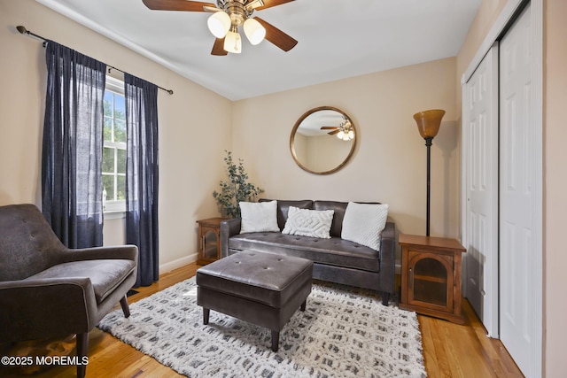 74 Kingsley Way, Freehold, NJ 07728 - living room featuring a ceiling fan and wood finished floors