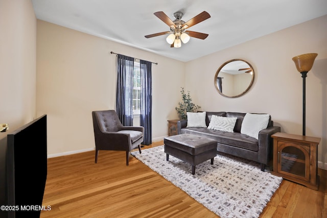 74 Kingsley Way, Freehold, NJ 07728 - living area with light wood-style flooring and a ceiling fan