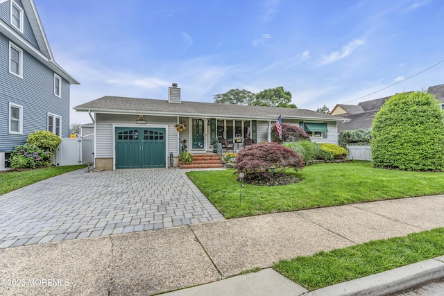 702 Saint Louis Ave, Point Pleasant Beach, NJ 08742 - single story home with an attached garage, decorative driveway, a porch, a chimney, and a gate