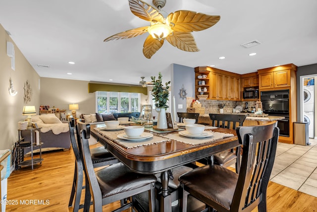 702 Saint Louis Ave, Point Pleasant Beach, NJ 08742 - dining space with stacked washer / drying machine, a ceiling fan, recessed lighting, and light wood-style flooring