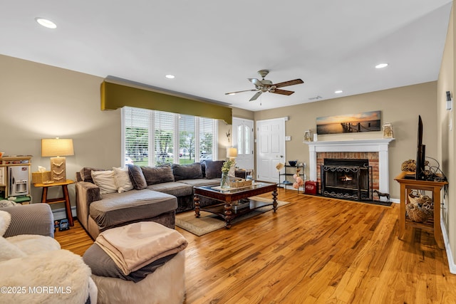 702 Saint Louis Ave, Point Pleasant Beach, NJ 08742 - living room with light wood-style floors, a ceiling fan, a baseboard radiator, recessed lighting, and a fireplace