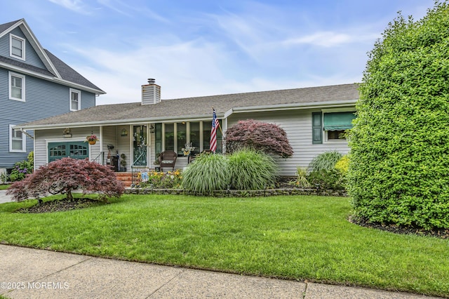 702 Saint Louis Ave, Point Pleasant Beach, NJ 08742 - view of front of house with covered porch, a chimney, and a front yard