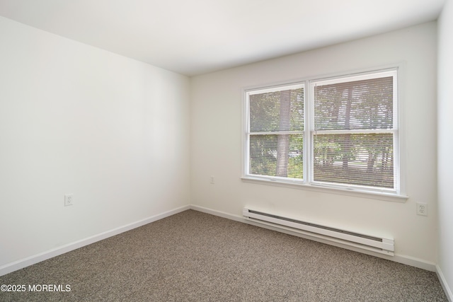 19 Cedar Ave, Manahawkin, NJ 08050 - carpeted spare room with a baseboard heating unit and baseboards