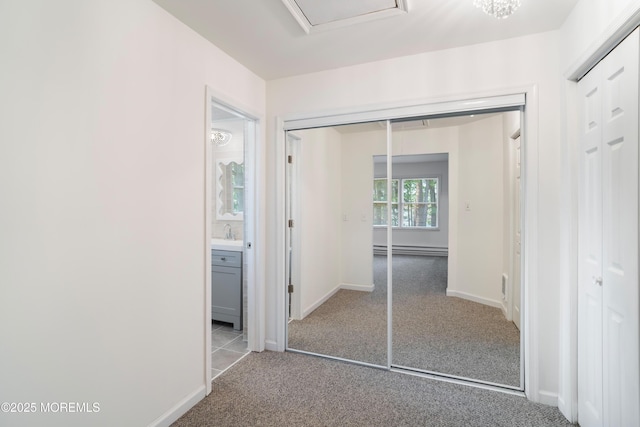 19 Cedar Ave, Manahawkin, NJ 08050 - unfurnished bedroom with carpet floors, baseboard heating, and ensuite bath