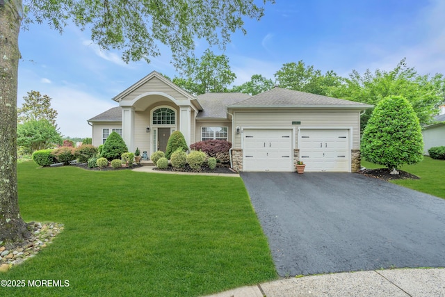 11 High Hill Ct, Manchester, NJ 08759 - view of front of home featuring driveway, a garage, a front yard, and stone siding