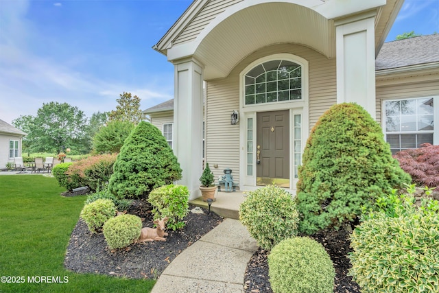 11 High Hill Ct, Manchester, NJ 08759 - doorway to property with a yard and roof with shingles