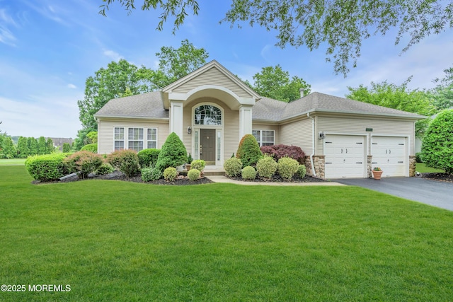 11 High Hill Ct, Manchester, NJ 08759 - view of front of property with asphalt driveway, a front lawn, a garage, and roof with shingles