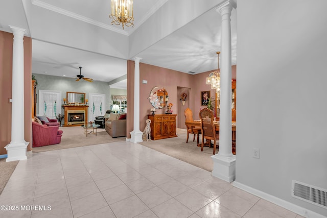 11 High Hill Ct, Manchester, NJ 08759 - entrance foyer featuring light carpet, ceiling fan, decorative columns, a lit fireplace, and ornamental molding