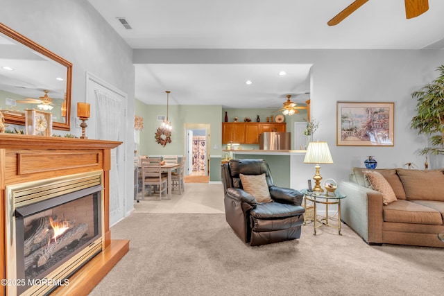 11 High Hill Ct, Manchester, NJ 08759 - living area featuring ceiling fan, light carpet, recessed lighting, and a warm lit fireplace