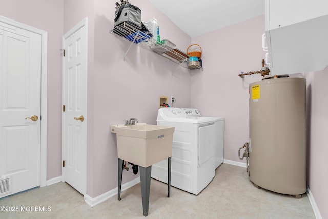 11 High Hill Ct, Manchester, NJ 08759 - laundry area with gas water heater, washer hookup, and light tile patterned flooring