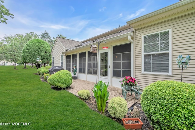 11 High Hill Ct, Manchester, NJ 08759 - back of house featuring a patio area, a lawn, and a sunroom