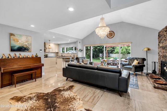 1159 County Line Rd E, Lakewood, NJ 08701 - living room featuring recessed lighting, vaulted ceiling, a chandelier, light marble finish flooring, and a large fireplace