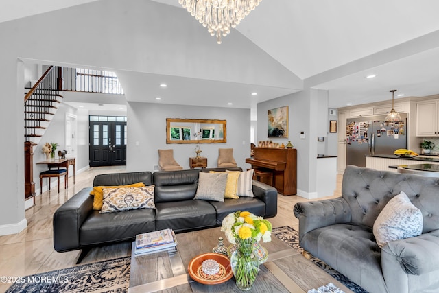 1159 County Line Rd E, Lakewood, NJ 08701 - living room featuring high vaulted ceiling, recessed lighting, stairway, a chandelier, and french doors