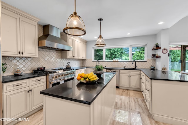 1159 County Line Rd E, Lakewood, NJ 08701 - kitchen featuring wall chimney range hood, stainless steel appliances, dark countertops, plenty of natural light, and recessed lighting