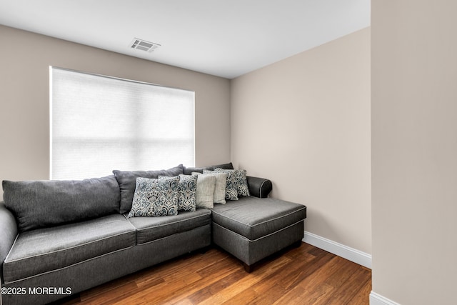 1159 County Line Rd E, Lakewood, NJ 08701 - living area featuring baseboards and wood finished floors