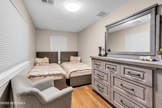 1159 County Line Rd E, Lakewood, NJ 08701 - bedroom with light wood-style flooring