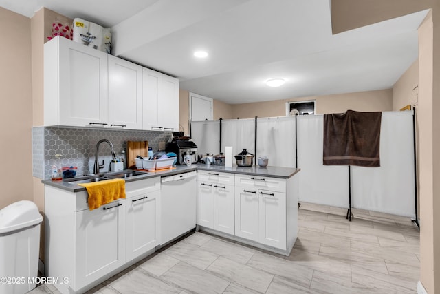 1159 County Line Rd E, Lakewood, NJ 08701 - kitchen with white dishwasher, tasteful backsplash, a peninsula, white cabinetry, and recessed lighting