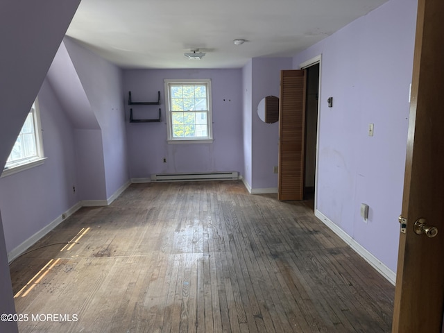 630 Overton Pl, Long Branch, NJ 07740 - bonus room featuring a baseboard heating unit and hardwood / wood-style floors