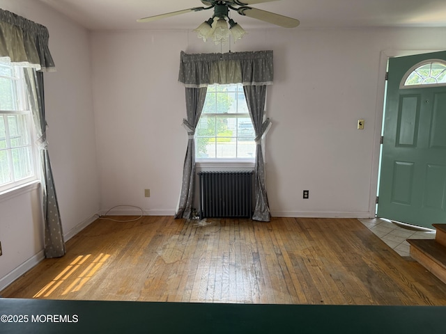630 Overton Pl, Long Branch, NJ 07740 - foyer with radiator heating unit, hardwood / wood-style floors, and ceiling fan