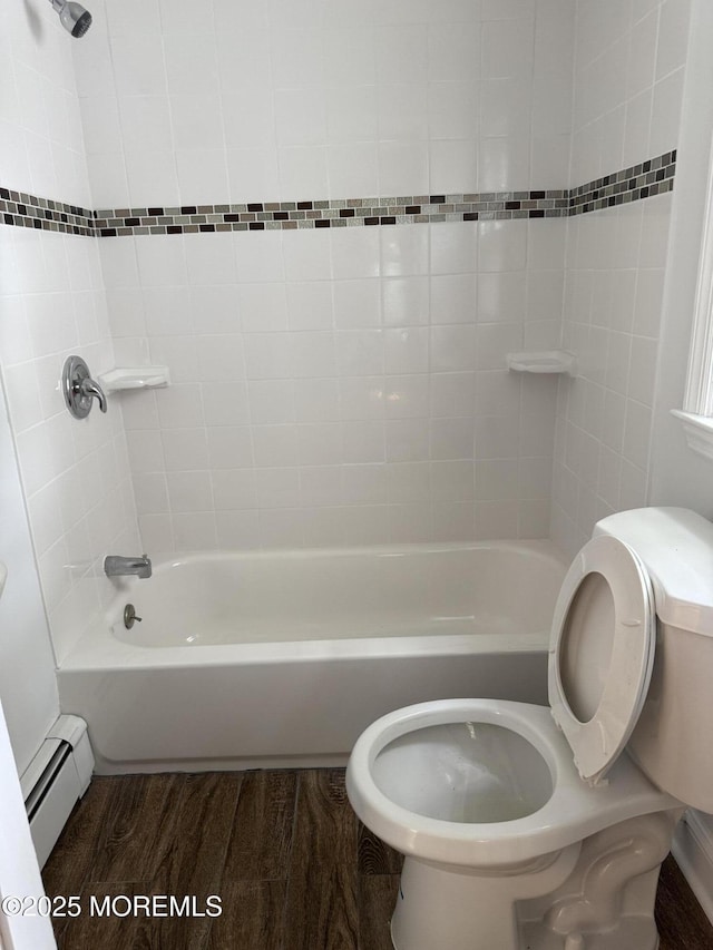 630 Overton Pl, Long Branch, NJ 07740 - full bath with a baseboard heating unit, wood finished floors, and bathing tub / shower combination