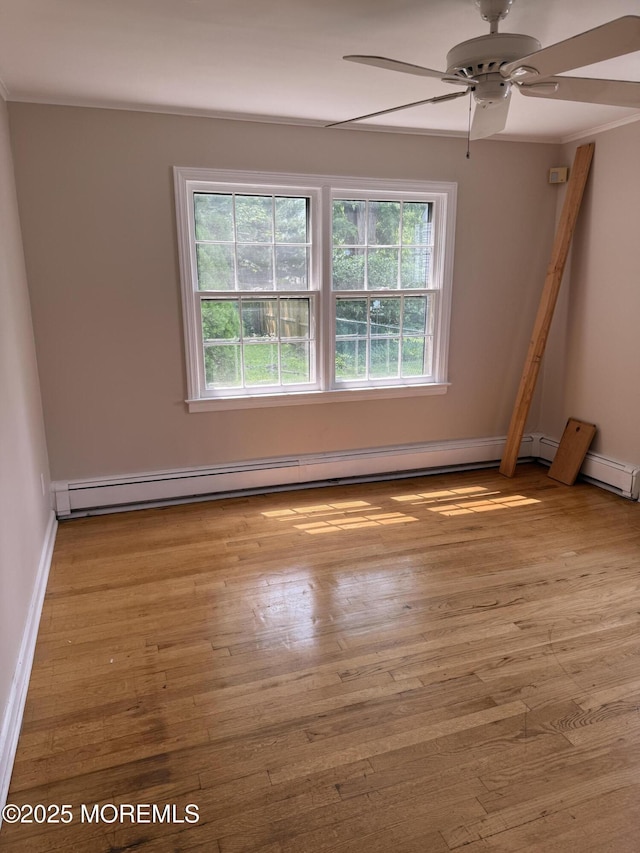 630 Overton Pl, Long Branch, NJ 07740 - unfurnished room with ceiling fan, hardwood / wood-style floors, crown molding, and a baseboard heating unit