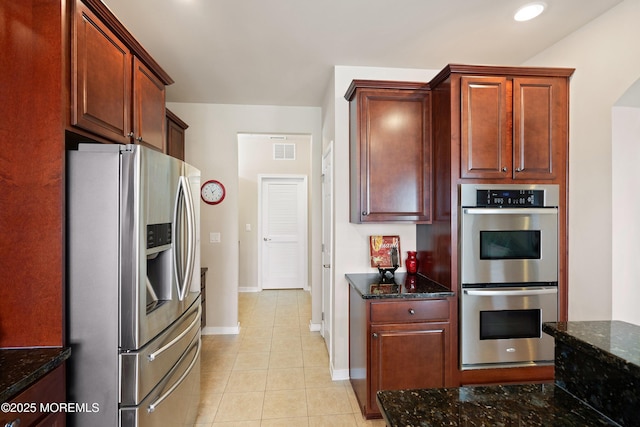 19 E Francesa Ct, Farmingdale, NJ 07727 - kitchen with appliances with stainless steel finishes, light tile patterned flooring, dark stone counters, and recessed lighting