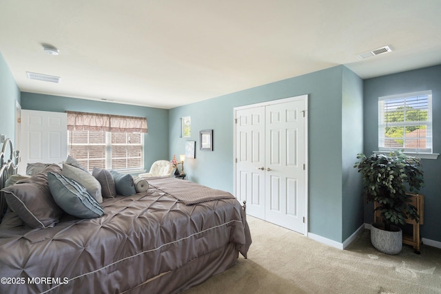 19 E Francesa Ct, Farmingdale, NJ 07727 - carpeted bedroom with a closet and baseboards