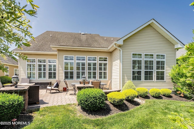 19 E Francesa Ct, Farmingdale, NJ 07727 - back of house featuring a patio, a lawn, and roof with shingles
