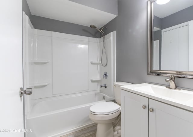 304 Wellington Pl, Aberdeen, NJ 07747 - bathroom featuring vanity, shower / bath combination, and wood finished floors