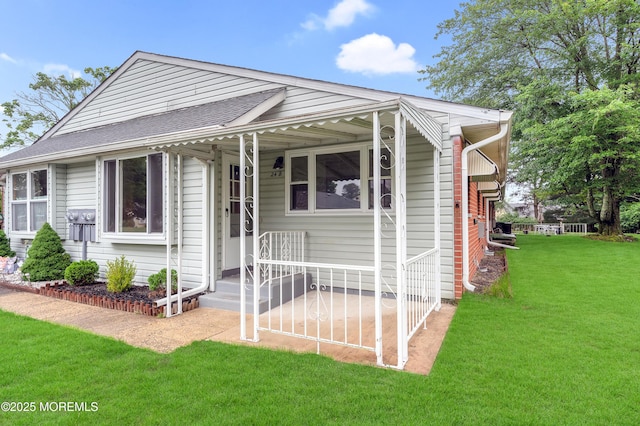24 Ironside Dr Unit B, Whiting, NJ 08759 - view of front of home with a front lawn and a shingled roof