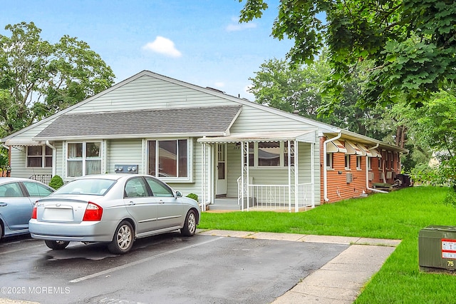 24 Ironside Dr Unit B, Whiting, NJ 08759 - view of front facade with a front lawn