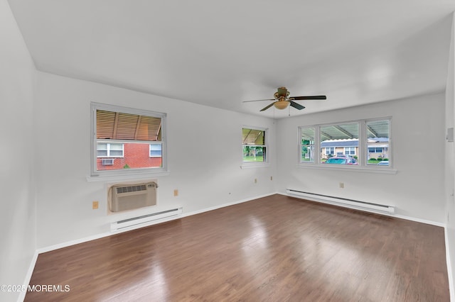 24 Ironside Dr Unit B, Whiting, NJ 08759 - spare room featuring a baseboard heating unit, a wall mounted AC, and wood finished floors