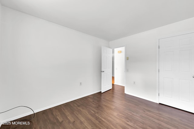 24 Ironside Dr Unit B, Whiting, NJ 08759 - unfurnished bedroom featuring wood finished floors and baseboards