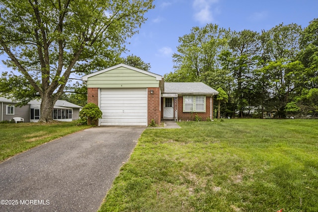 6 Lincoln Ct, Whiting, NJ 08759 - view of front facade with brick siding, asphalt driveway, a front lawn, and an attached garage