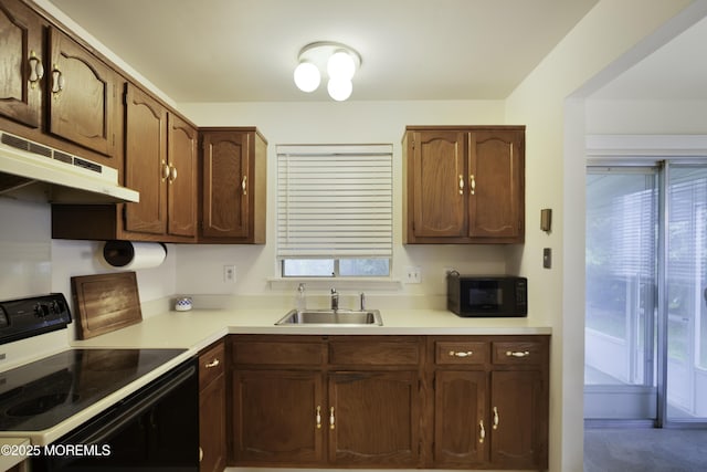 6 Lincoln Ct, Whiting, NJ 08759 - kitchen with black appliances, under cabinet range hood, and healthy amount of natural light