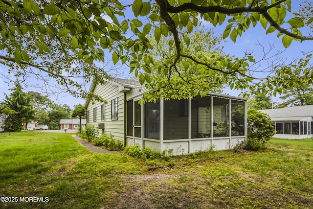 6 Lincoln Ct, Whiting, NJ 08759 - back of house with a sunroom and a lawn