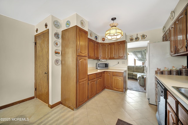 72 1st Ave, Port Reading, NJ 07064 - kitchen with dishwashing machine, stainless steel microwave, light tile patterned floors, light countertops, and brown cabinetry