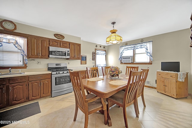 72 1st Ave, Port Reading, NJ 07064 - dining area with light tile patterned floors and cooling unit
