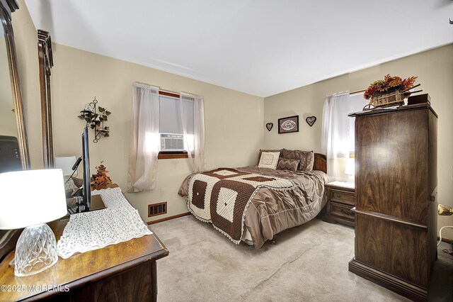 72 1st Ave, Port Reading, NJ 07064 - bedroom with light carpet and cooling unit