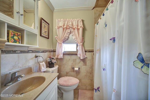 72 1st Ave, Port Reading, NJ 07064 - full bathroom with tile walls, crown molding, vanity, a shower with shower curtain, and a wainscoted wall