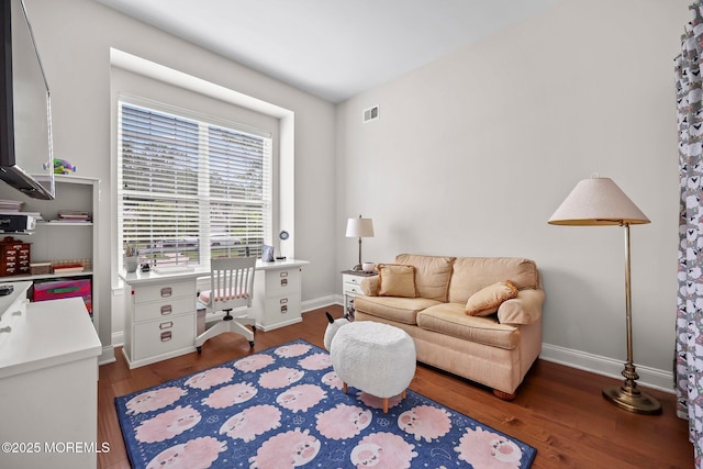 86 Legacy Ct, Freehold, NJ 07728 - living area with wood finished floors and a desk