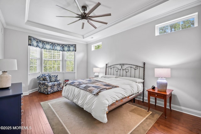 86 Legacy Ct, Freehold, NJ 07728 - bedroom with multiple windows, a tray ceiling, crown molding, wood finished floors, and ceiling fan