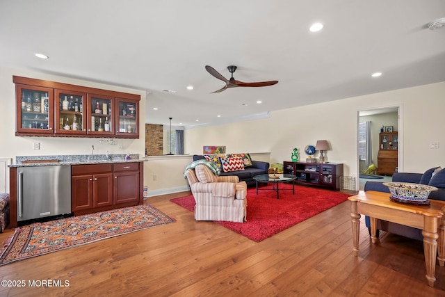 86 Legacy Ct, Freehold, NJ 07728 - living room with light wood-style flooring, a ceiling fan, wet bar, and recessed lighting
