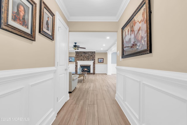 18 Pinewood Dr, Brick, NJ 08724 - corridor with a decorative wall, crown molding, wainscoting, and light wood-type flooring