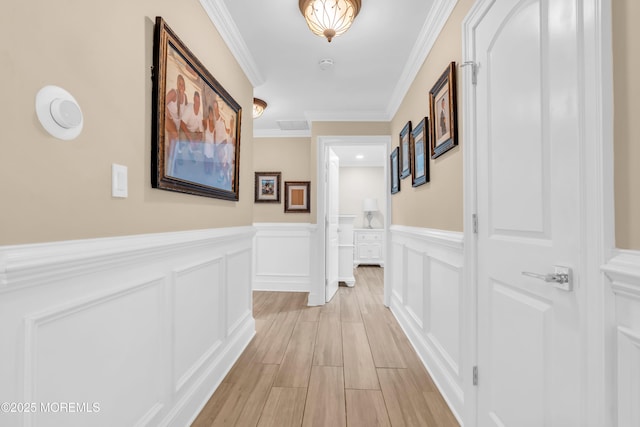 18 Pinewood Dr, Brick, NJ 08724 - hallway featuring a decorative wall, wainscoting, light wood finished floors, and ornamental molding